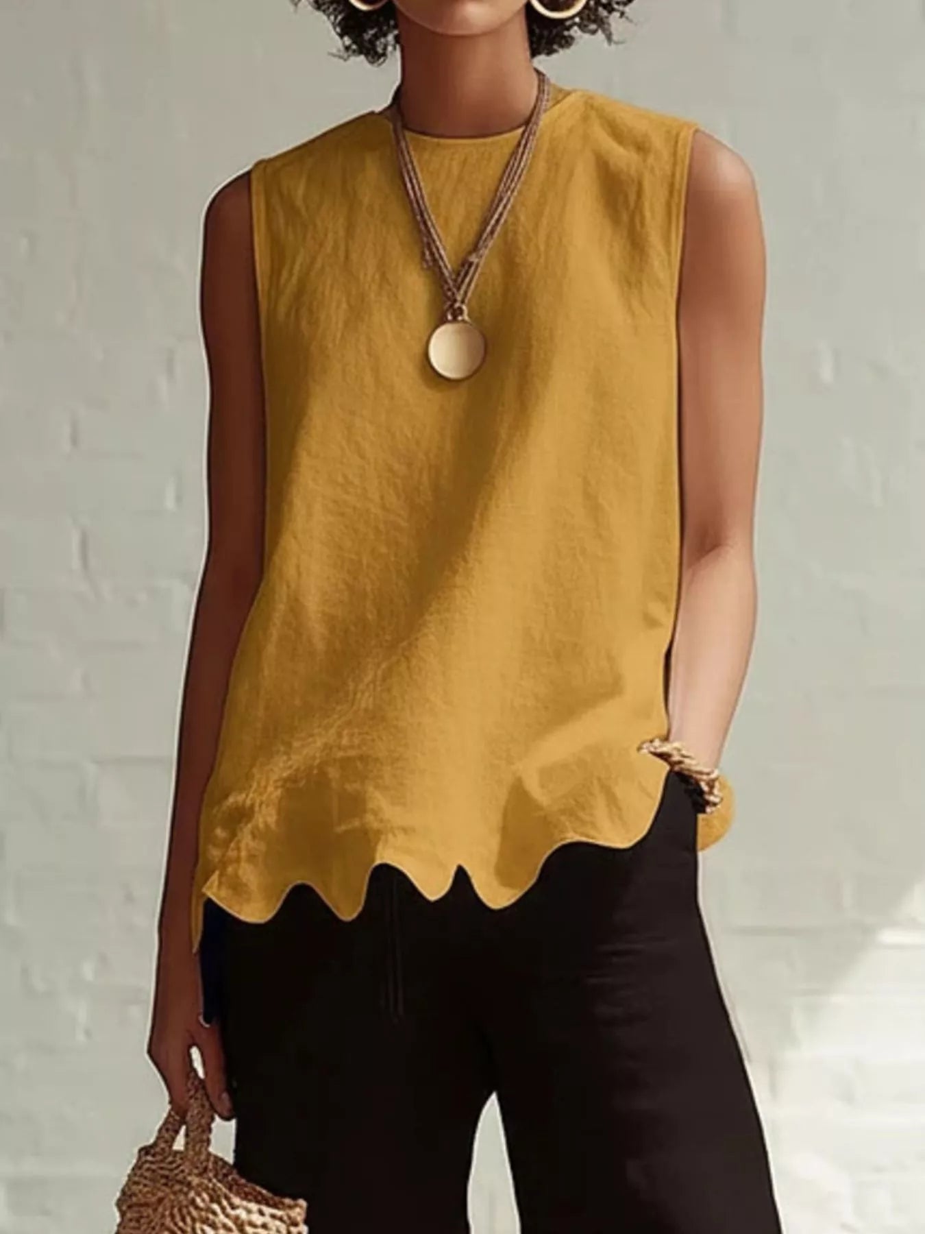 Odile scalloped hem sleeveless blouse in yellow by Pinup Girl Clothing