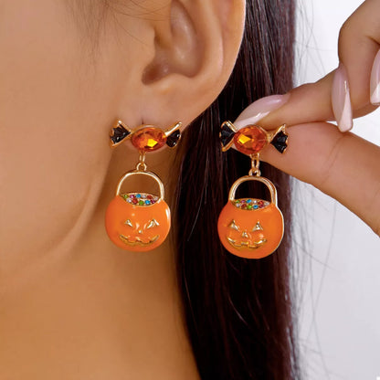 Pumpkin Patch rhinestone drop earrings in orange and gold by Pinup Girl Clothing