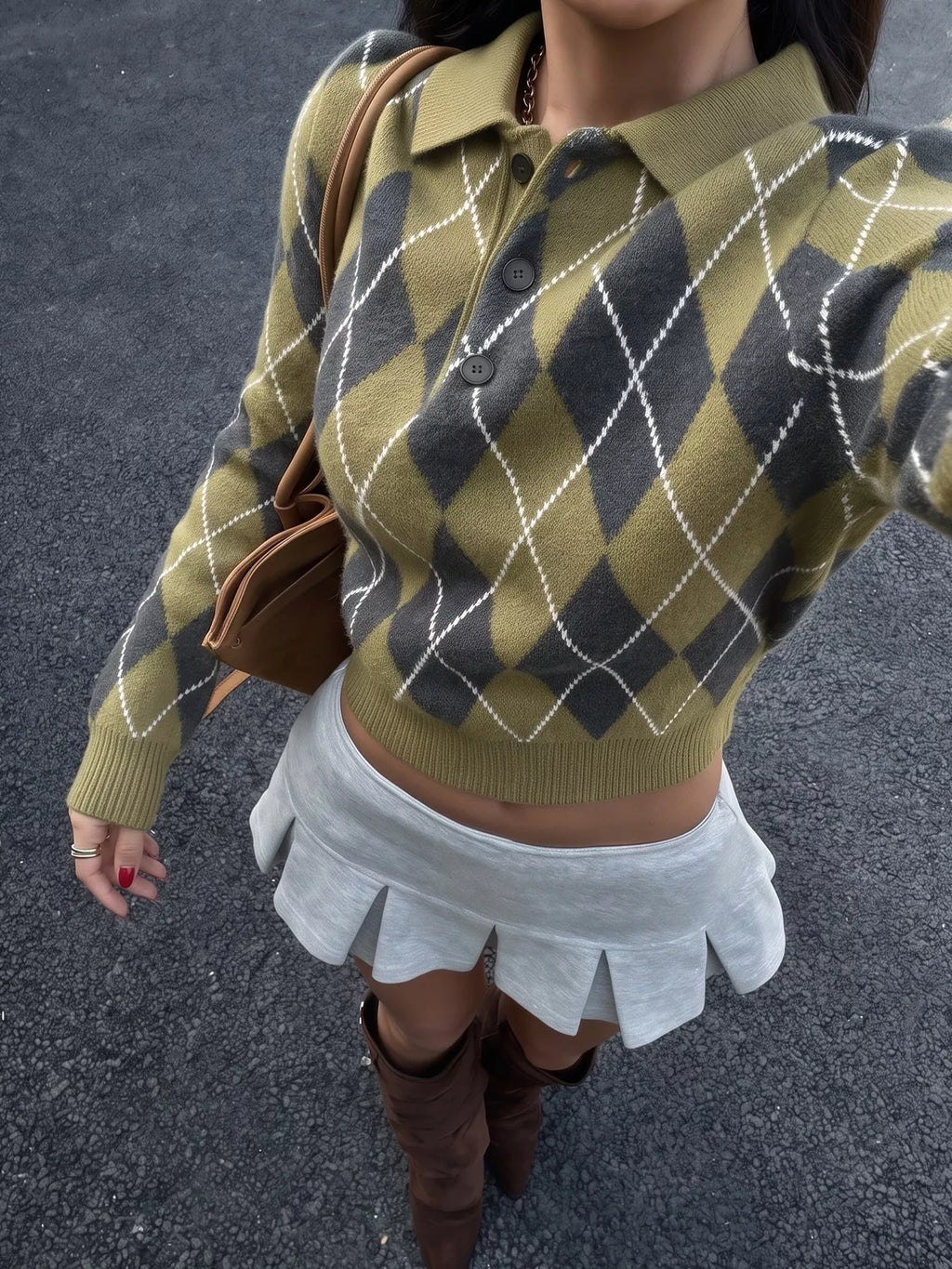 Prep School argyle cropped polo sweater in olive green styled with a pleated mini