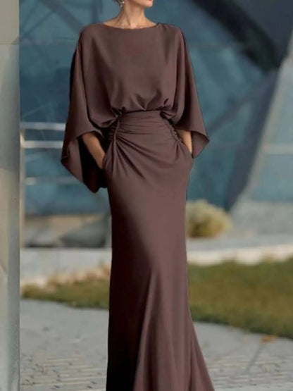 Batwing ruched maxi dress in brown by Pinup Girl Clothing.