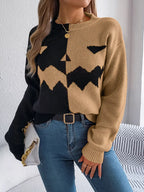 Carved two-tone pumpkin face sweater in black and camel