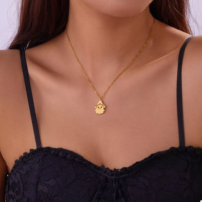 Close-up of the gold ghost pendant charm