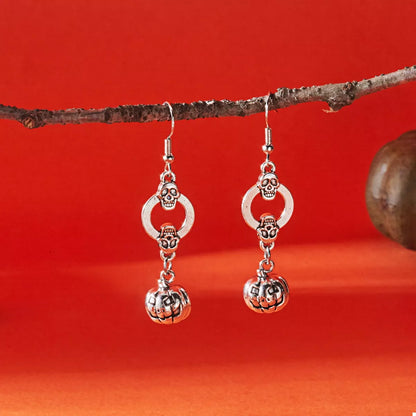 Pair of silver skull and jack-o'-lantern dangle earrings