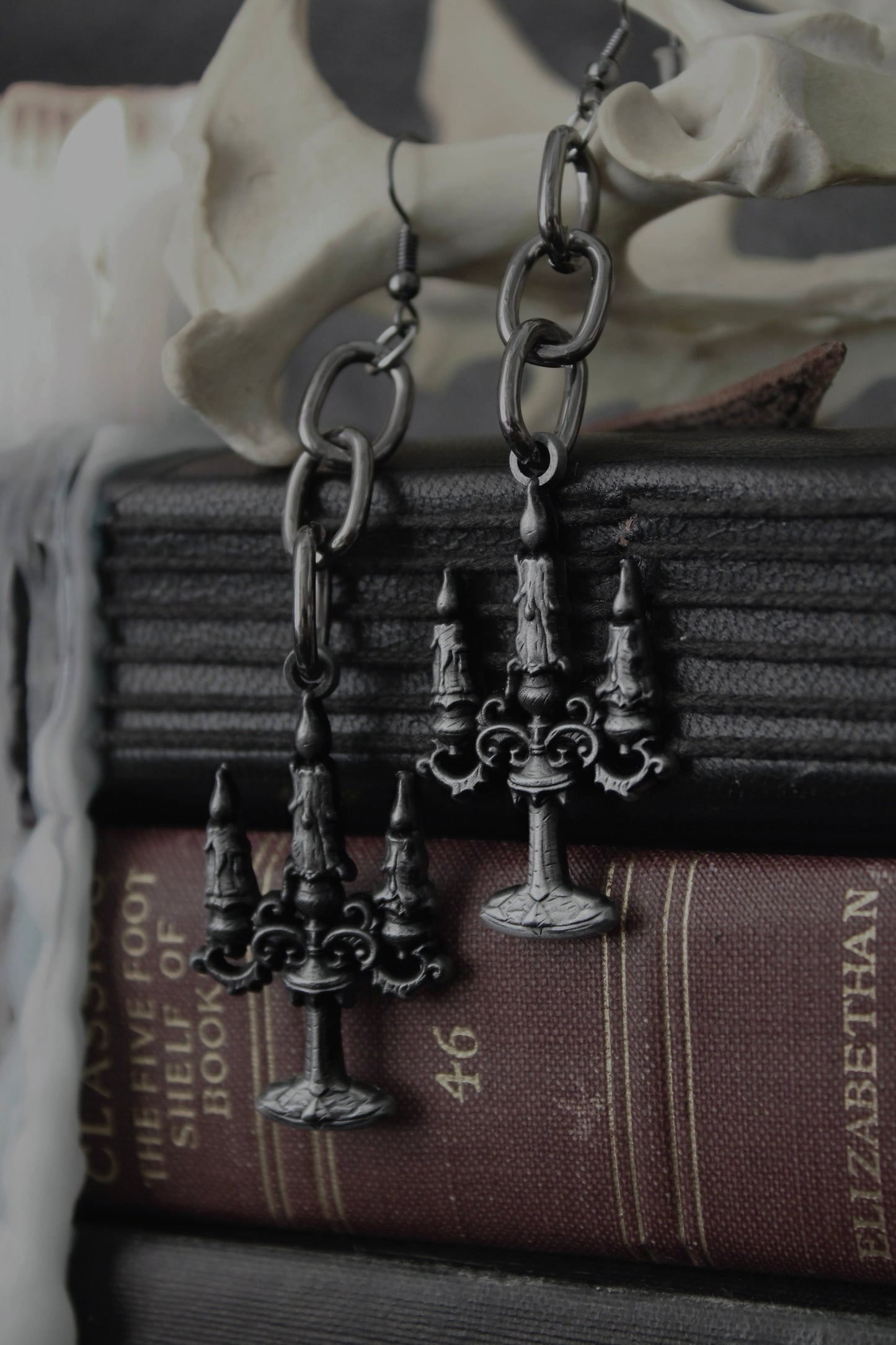 Close-up of the blackened candelabra charm on the Black Mass earrings, The Pretty Cult