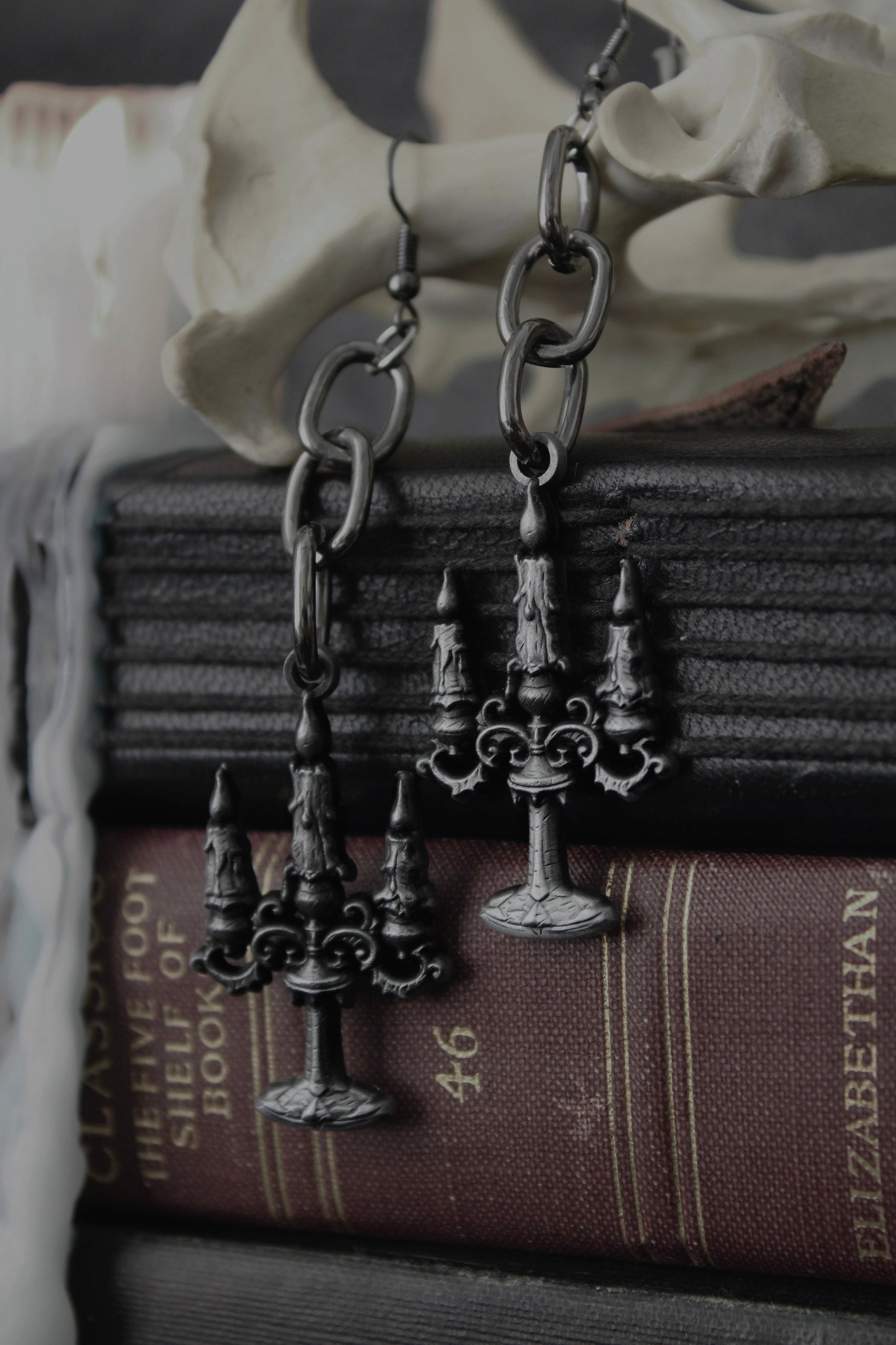 Close-up of the blackened candelabra charm on the Black Mass earrings, The Pretty Cult
