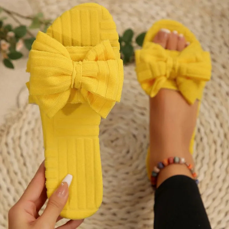 Leyla bow-knot open-toe slide sandals in yellow by Pinup Girl Clothing