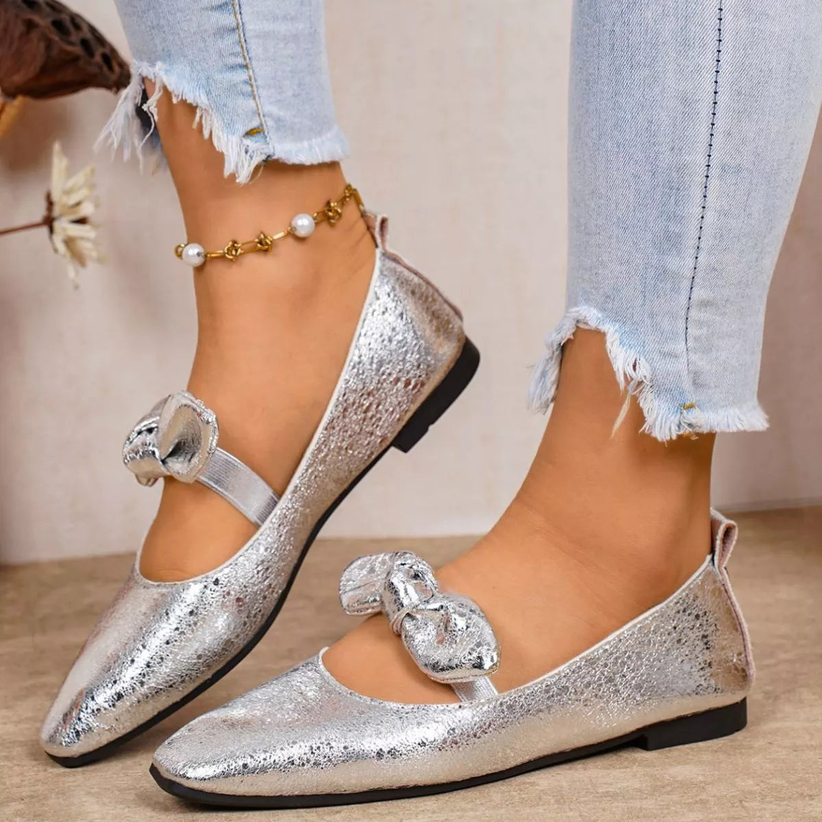 Bow square-toe slip-on flats in gray by Pinup Girl Clothing.