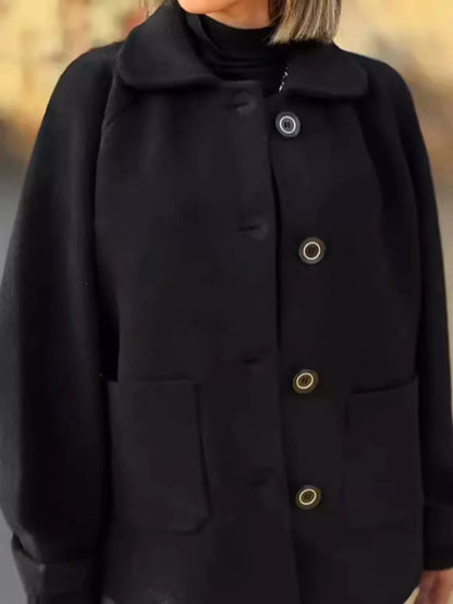 Matinee button-front raglan coat in black by Pinup Girl Clothing