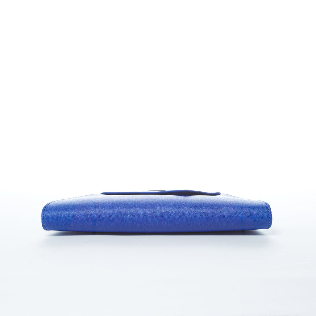 Angelica cobalt blue crosshatched leather clutch with a diagonal flap and removable chain strap, by Pinup Girl Clothing