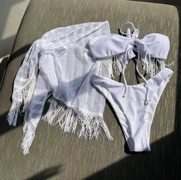 Tasseled mesh three-piece bikini set in white by Pinup Girl Clothing.