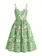 Amalie 70s ballerina swing dress in green Noto tile print with full pocketed skirt