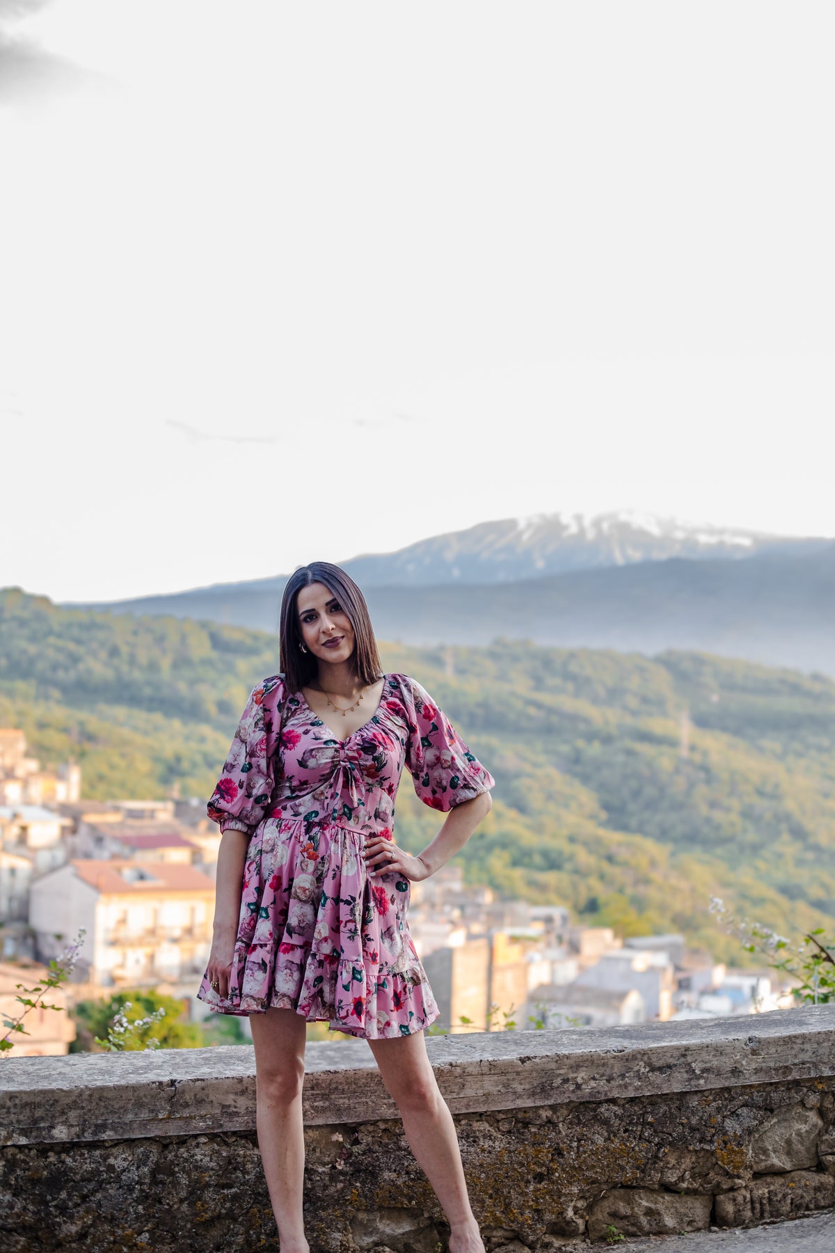Molly Mini dress in Ambrosia Floral mauve pink with a gathered bodice and long sleeves, by Pinup Girl Clothing