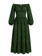 Swann Maxi Dress in Black Serpente, green foliage and gold snakes on black, off-shoulder bodice and full gathered maxi skirt