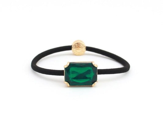 Crown Jewel ponytail hair tie with an emerald green crystal, by Pinup Girl Clothing