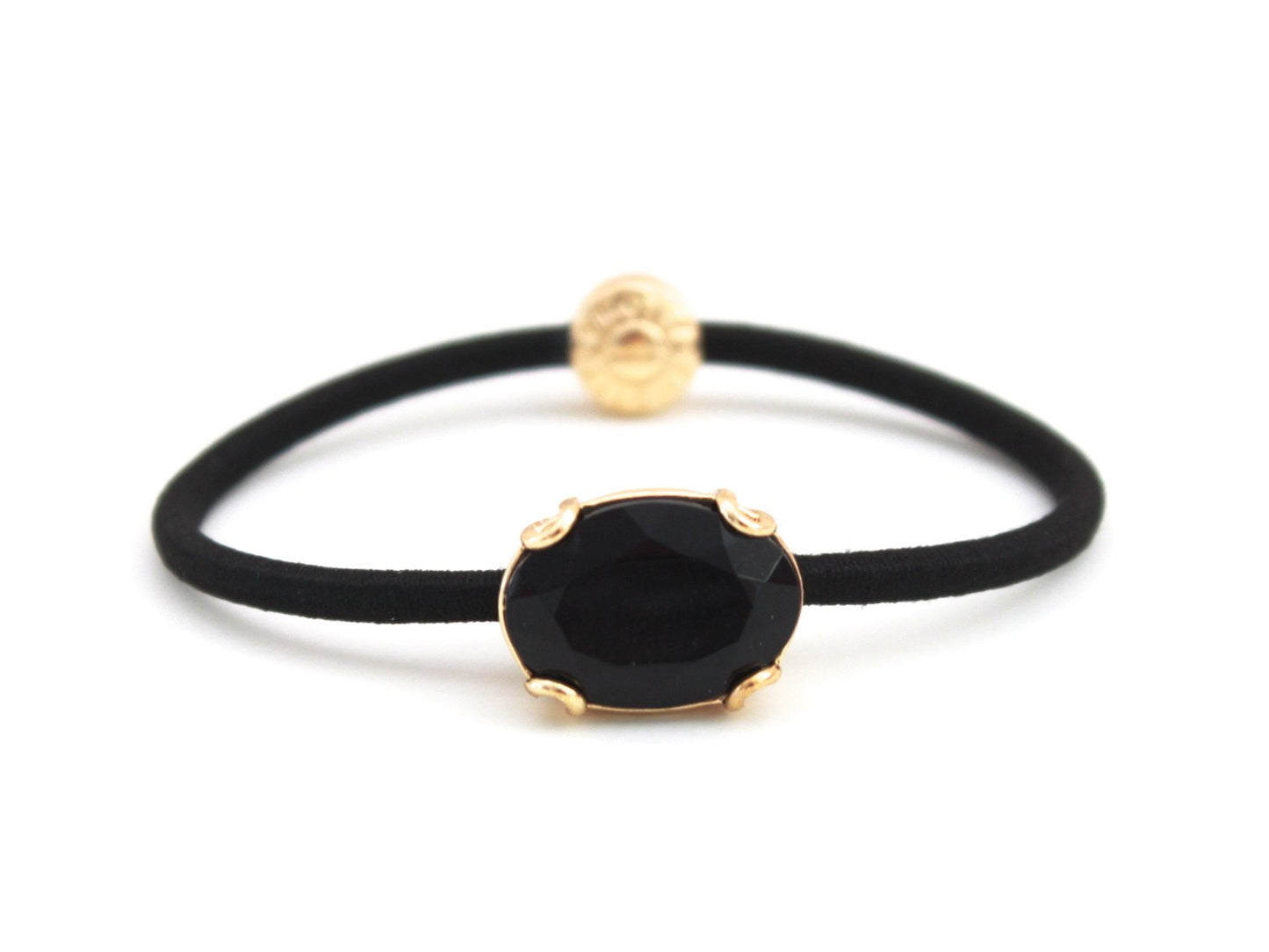 Crown Jewel ponytail hair tie with a jet black crystal, by Pinup Girl Clothing