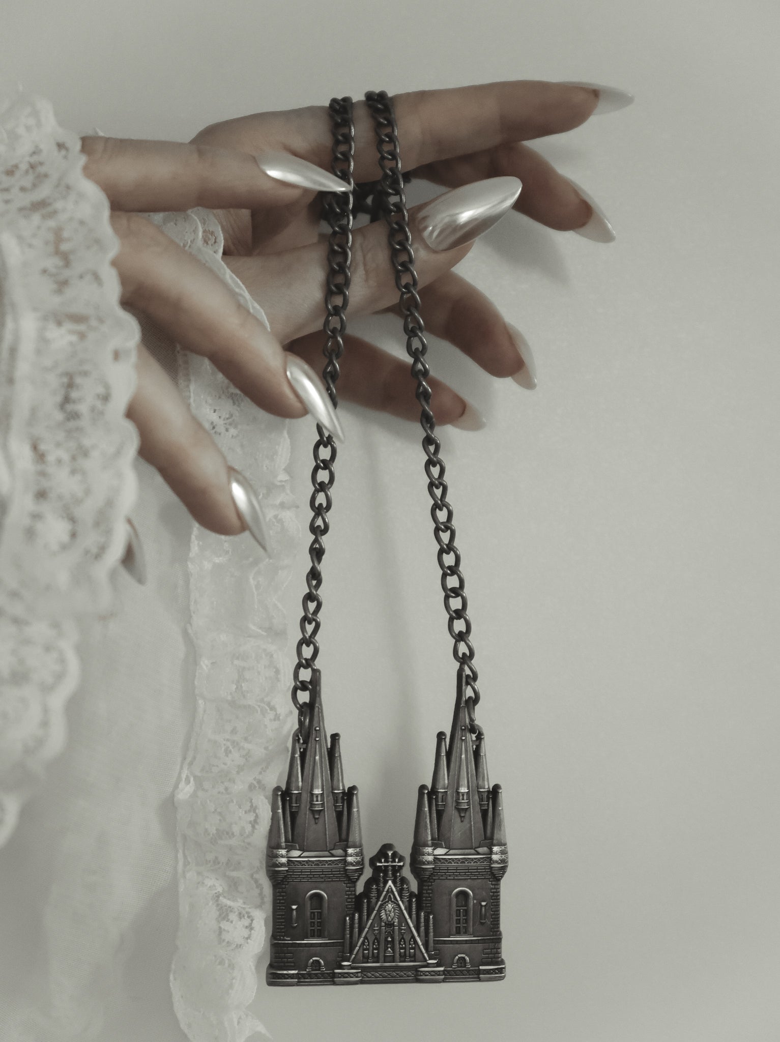Tyn Cathedral antique silver statement necklace styled on model