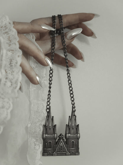Tyn Cathedral antique silver statement necklace styled on model