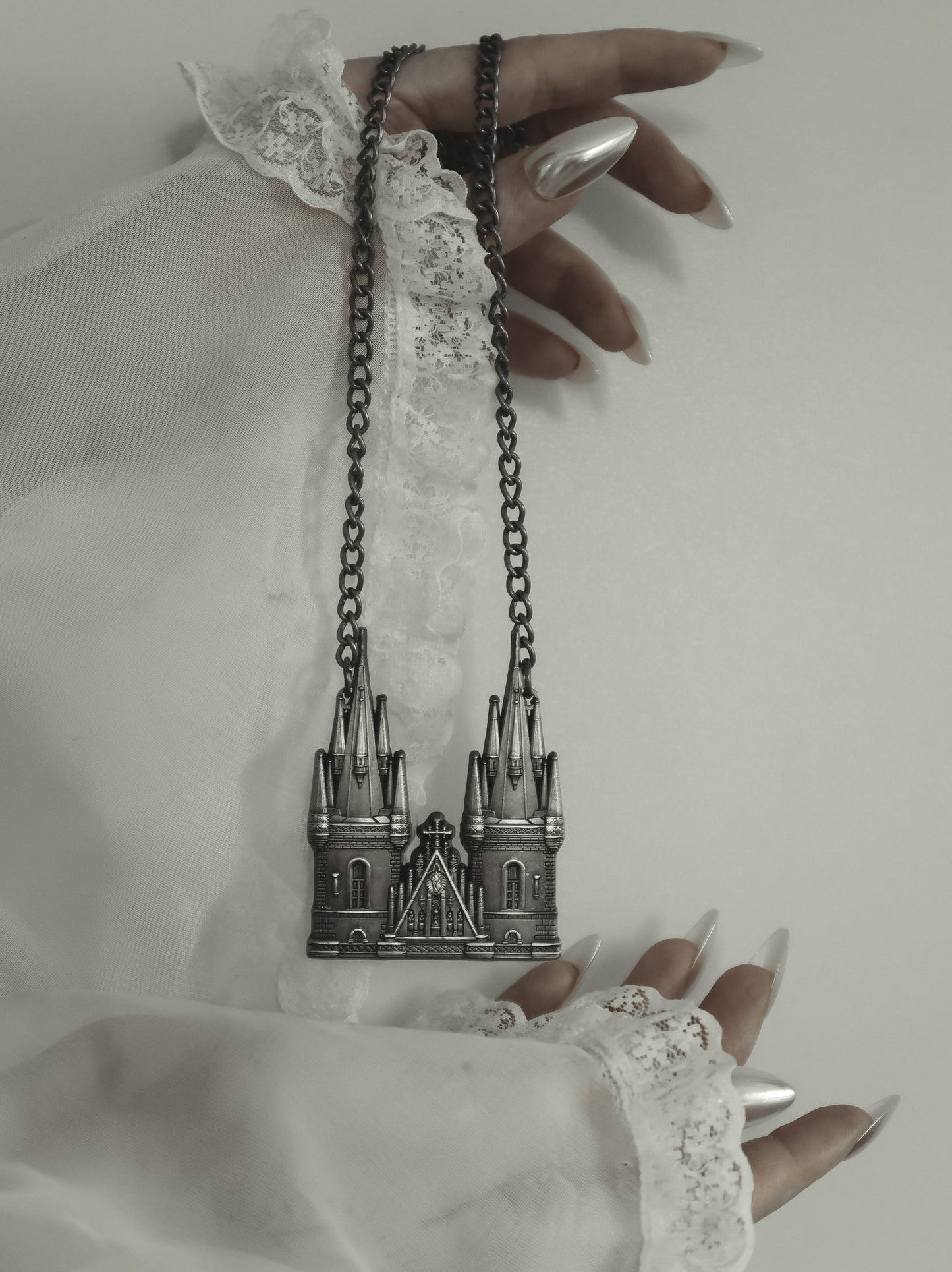 Side view of the Tyn Cathedral antique silver necklace