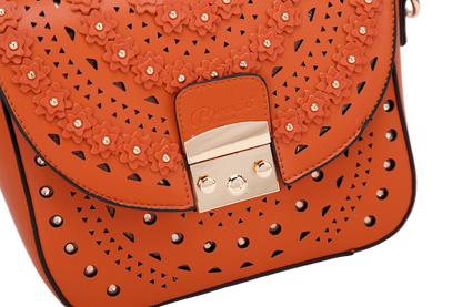 Celestial Star crystal crossbody bag in rosé with a removable strap and gold studs, by Pinup Girl Clothing