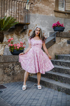 Amara swing dress in pink and white Noto Tile print with puff sleeves and a full swing skirt, by Pinup Girl Clothing