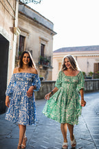 Marie-Therese peasant day dress in green and white Noto Tile print with a full skirt and deep pockets, by Pinup Girl Clothing