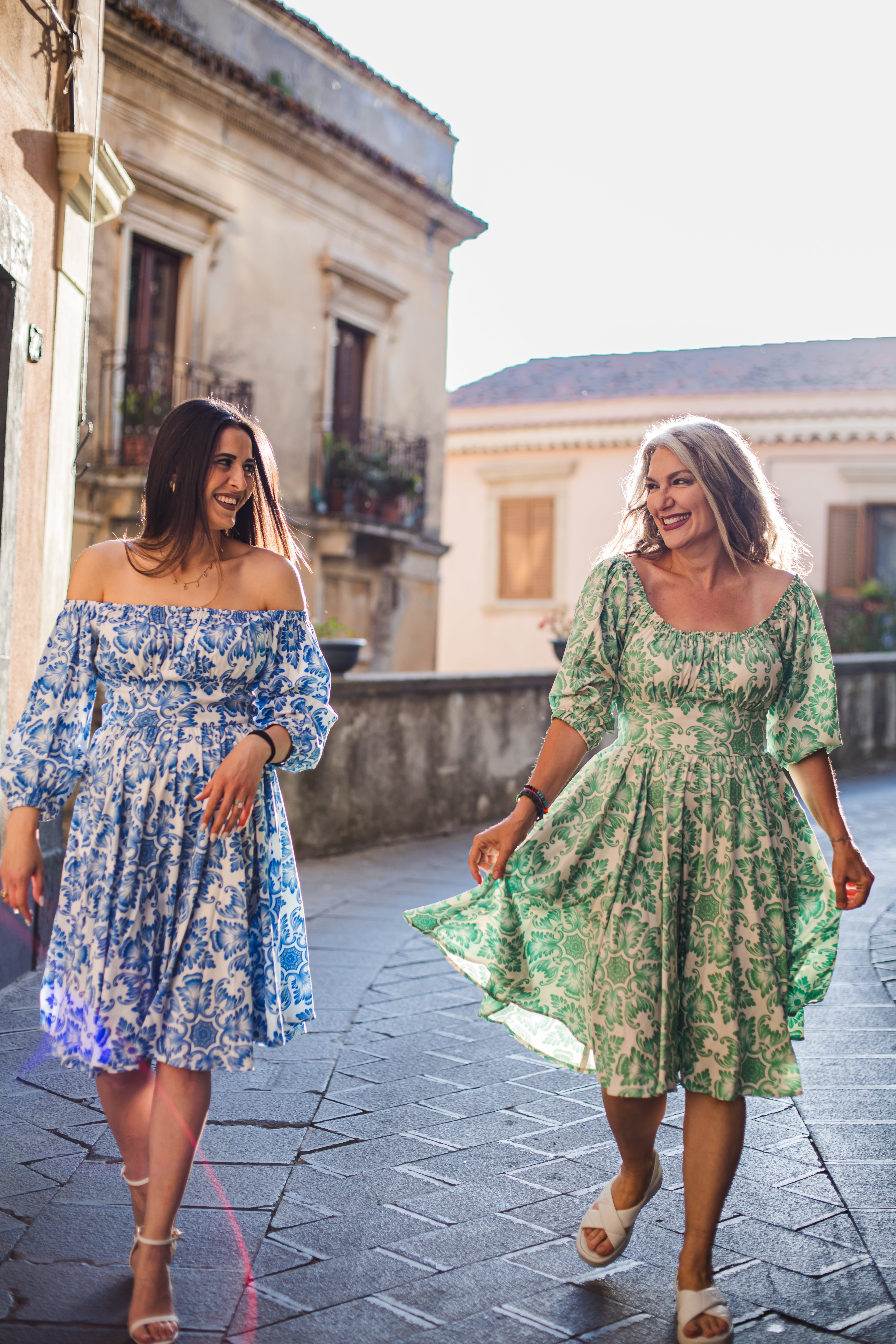 Marie-Therese peasant day dress in green and white Noto Tile print with a full skirt and deep pockets, by Pinup Girl Clothing