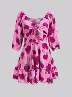 Molly Mini dress in pink Spring Bee floral, styled by Pinup Girl Clothing, sizes XS to 5X.