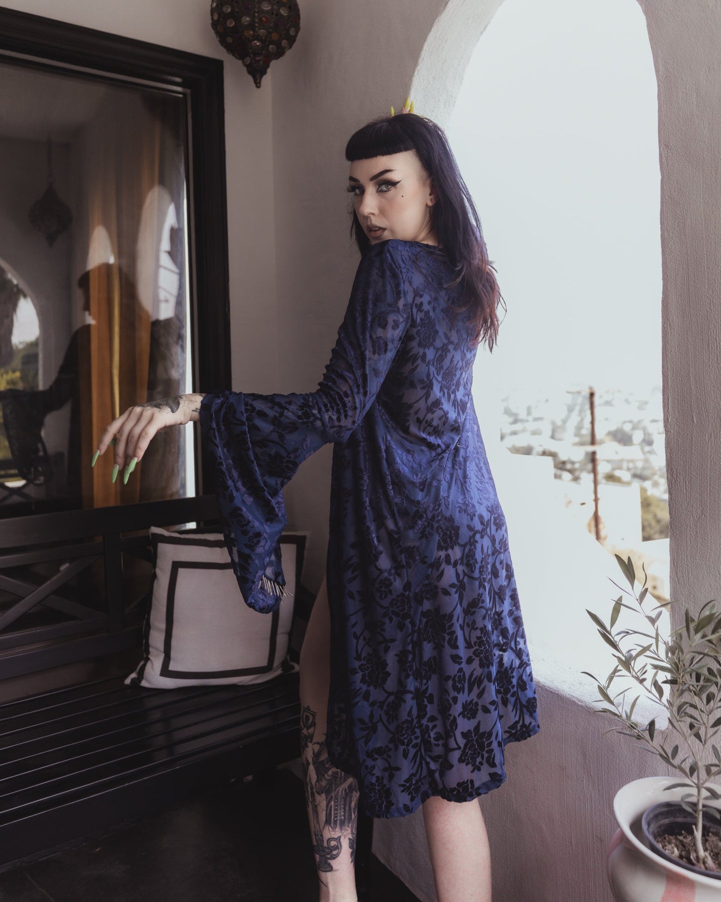 Blue velvet kimono worn open over a matching lingerie set