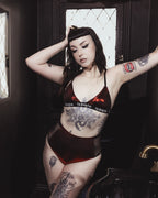 Metallic red Avoid Bralette, signature elastic band detail