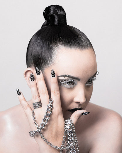 Model wearing the Cemetery Walks sterling silver statement ring