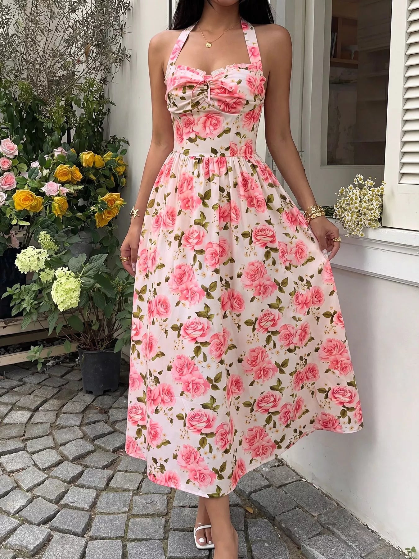 Floral halter midi dress by Pinup Girl Clothing, in blush, sizes S to XL.