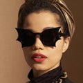 Nightwing bat wing sunglasses in black
