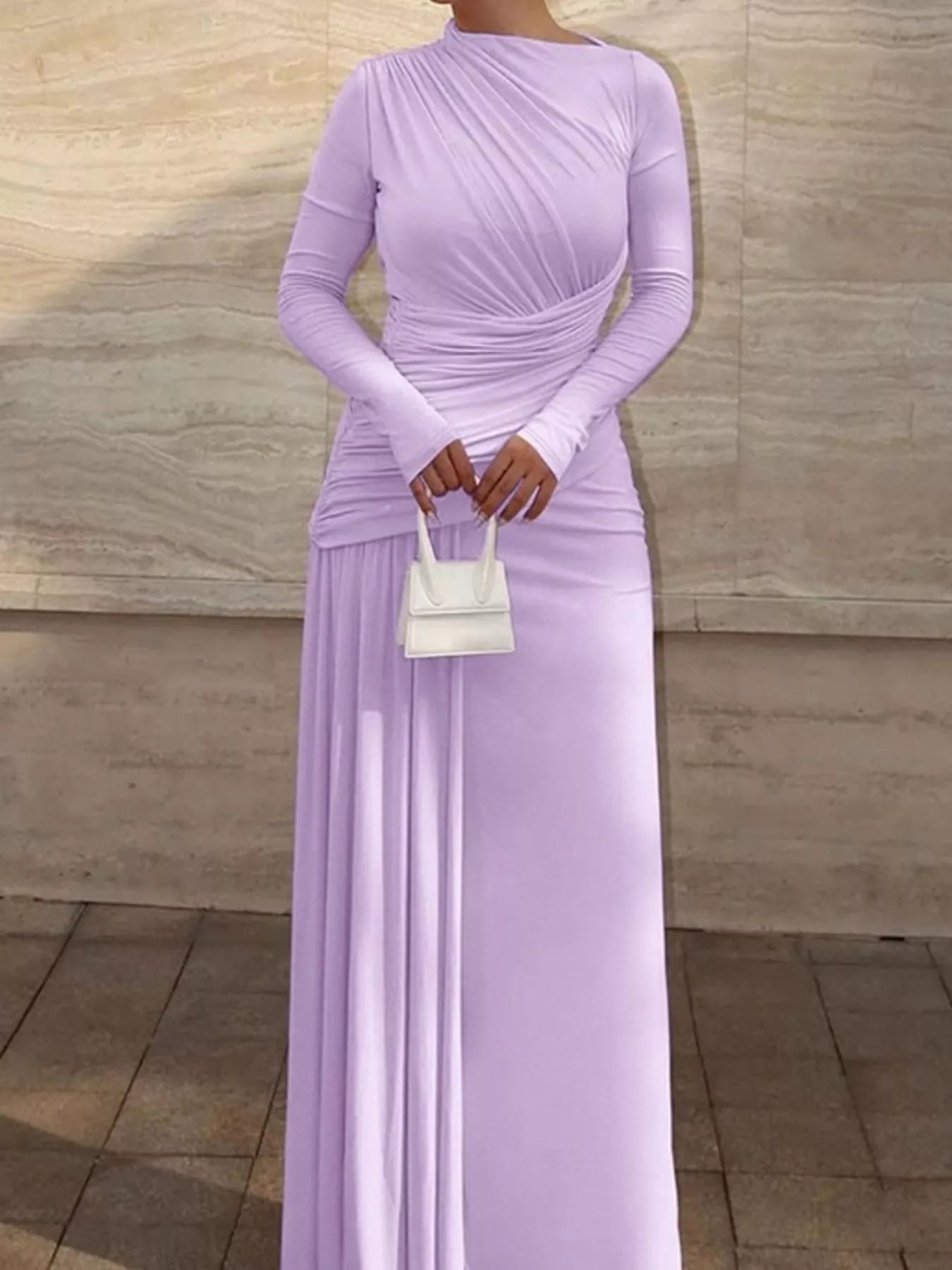 Ruched long-sleeve maxi dress in lavender by Pinup Girl Clothing.