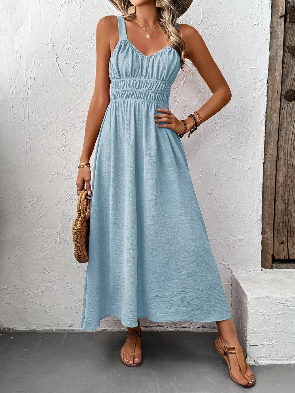Smocked sundress midi in light blue by Pinup Girl Clothing.