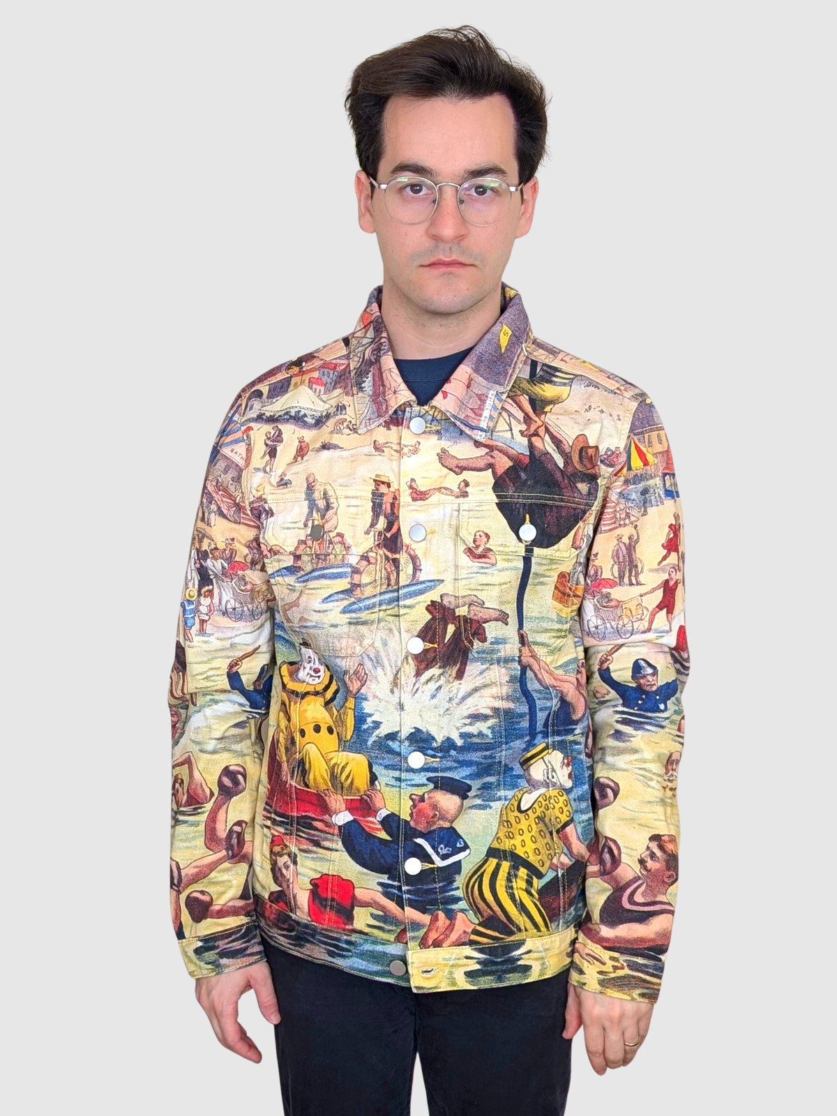 Front view of the Bathing Clown Denim Jacket buttoned up, yellow clown in the waves across the front