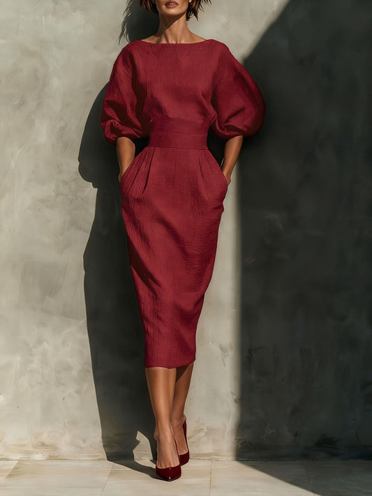 Puff-sleeve pencil midi dress in wine red by Pinup Girl Clothing, with pockets.