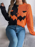 Carved two-tone pumpkin face sweater in black and orange