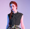 Black Bow Top, a 1950s sleeveless cotton blouse with an oversized neck bow