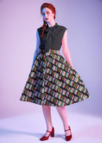 Black Bow Top, a 1950s sleeveless cotton blouse with an oversized neck bow