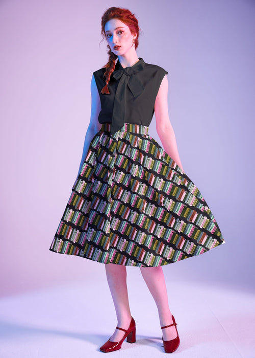 Black Bow Top, a 1950s sleeveless cotton blouse with an oversized neck bow