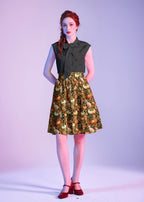 Black Bow Top, a 1950s sleeveless cotton blouse with an oversized neck bow
