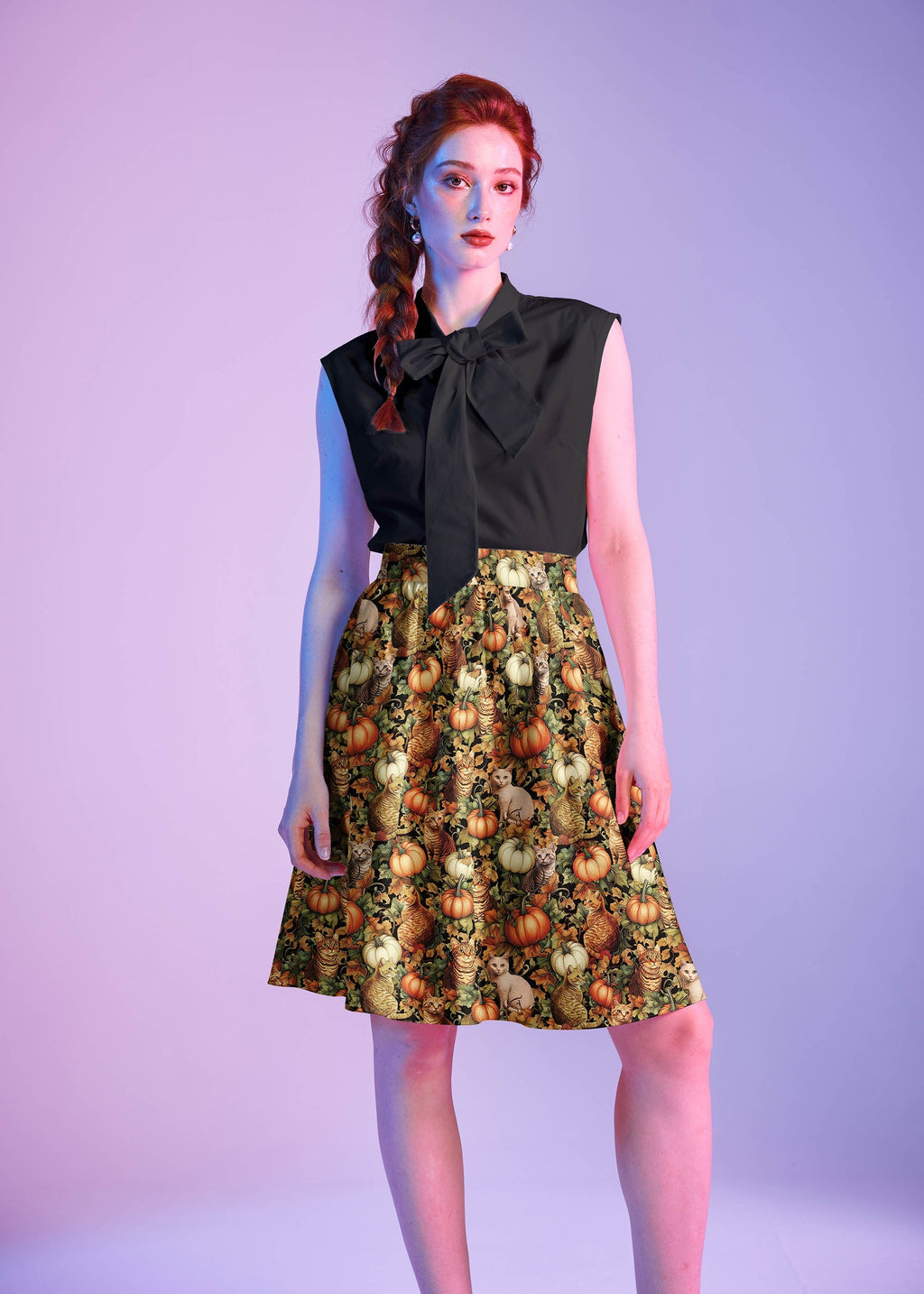 Black Bow Top, a 1950s sleeveless cotton blouse with an oversized neck bow