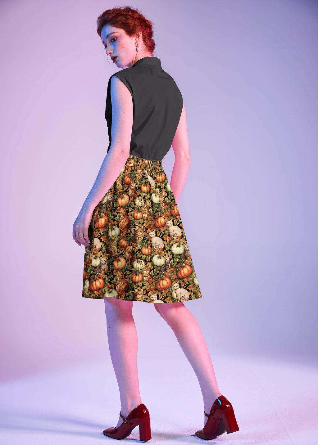 Black Bow Top, a 1950s sleeveless cotton blouse with an oversized neck bow