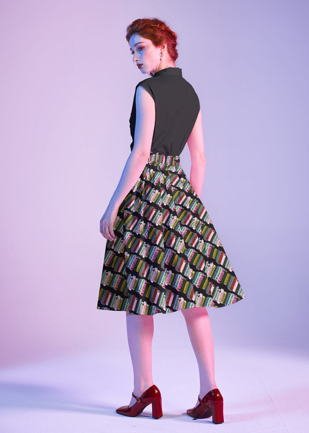 Black Bow Top, a 1950s sleeveless cotton blouse with an oversized neck bow