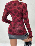 Black Widow sheer mesh spiderweb top in burgundy, back view