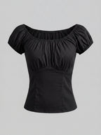 The Gathered Peasant Top in solid black stretch sateen by Pinup Girl Clothing, sizes XS to 5X.
