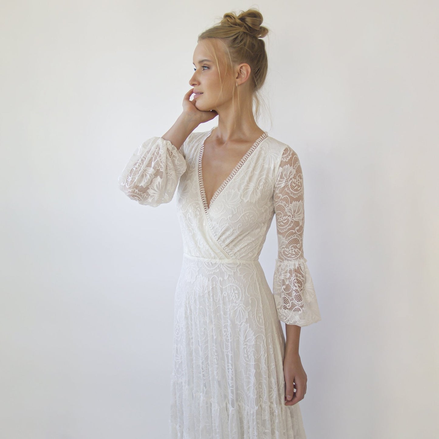 Juniper ivory fringed lace wrap gown, full length on the model