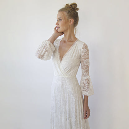 Juniper ivory fringed lace wrap gown, full length on the model
