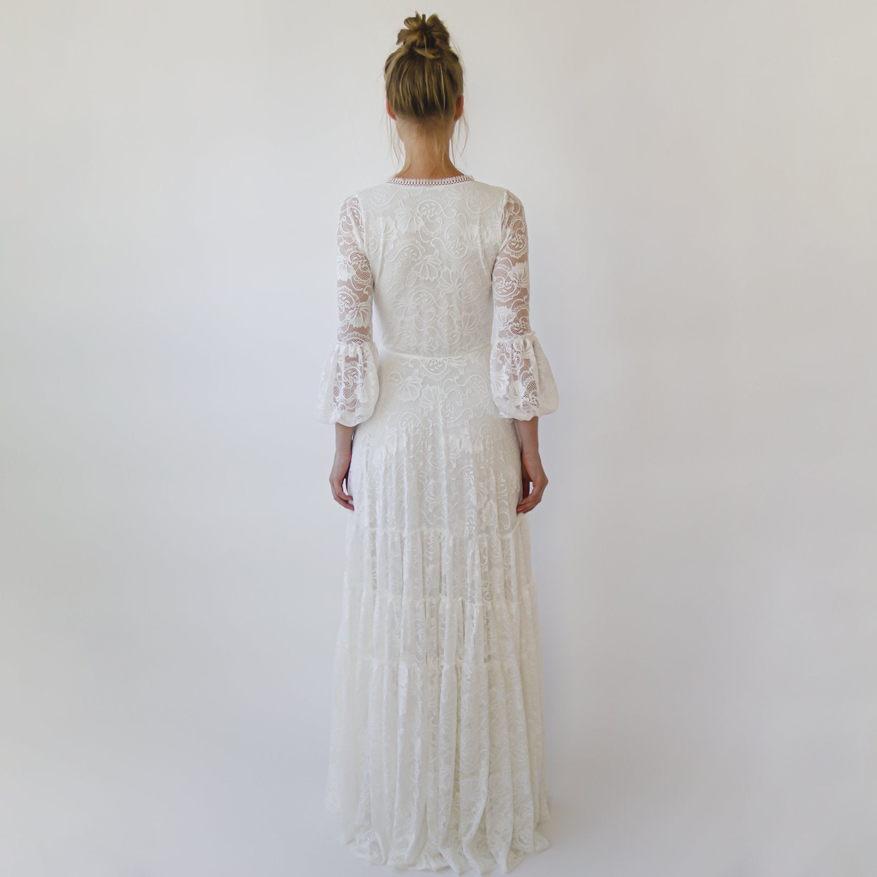 Juniper ivory lace gown, front view showing the wrap bodice and floor-length skirt