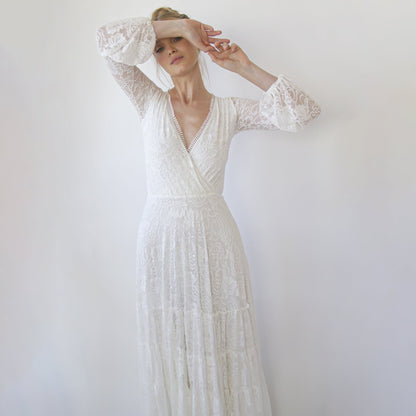 Juniper ivory lace gown showing the elasticated waist and skirt drape